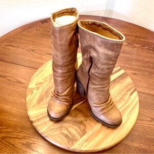 Distressed leather boot.